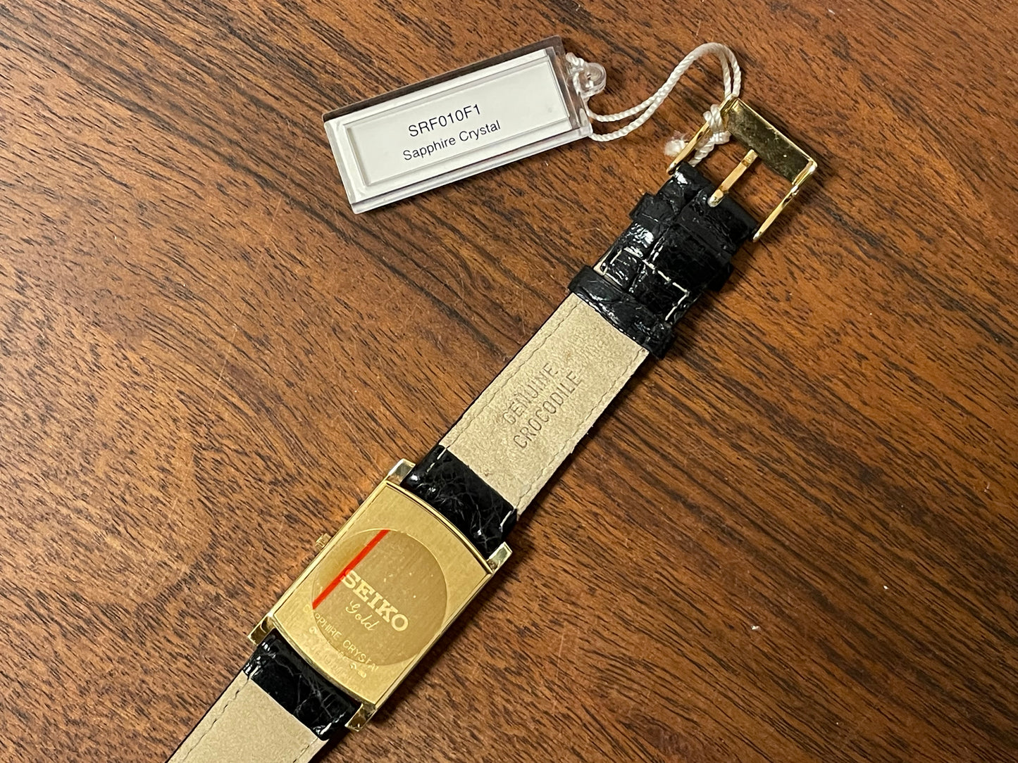(1990s) Seiko 7N01-0BA8 18K gold collection "tank" - 18k solid gold case - white & cream dial (NOS + full set)