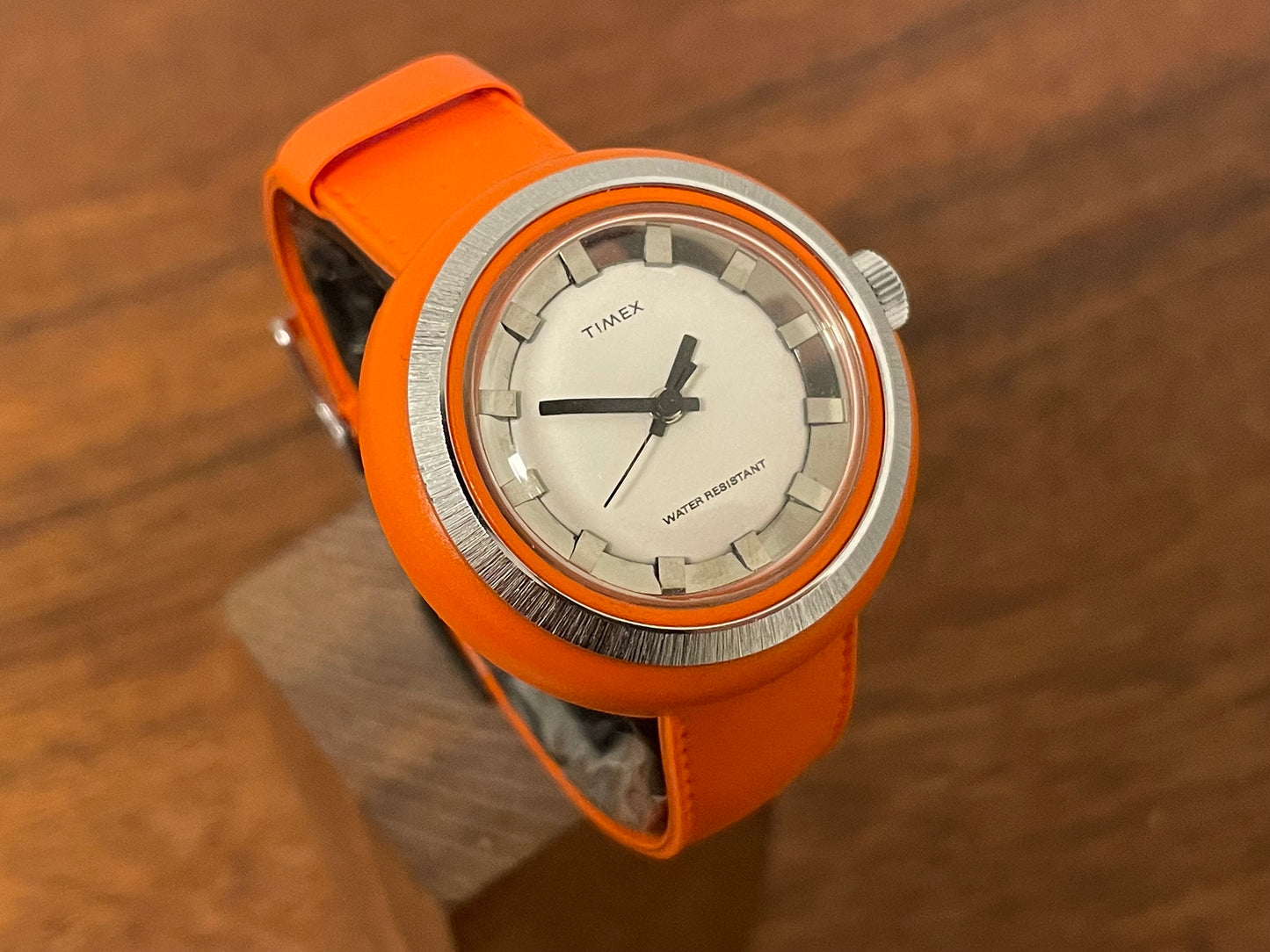 (1970s) Timex 290-181 UFO - orange plastic case - white dial w/ silver markers - small size (NOS + full set)