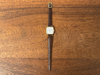 (1970s) Tissot Boutique dress watch - white dial w/ black Roman numerals - small size (NOS)