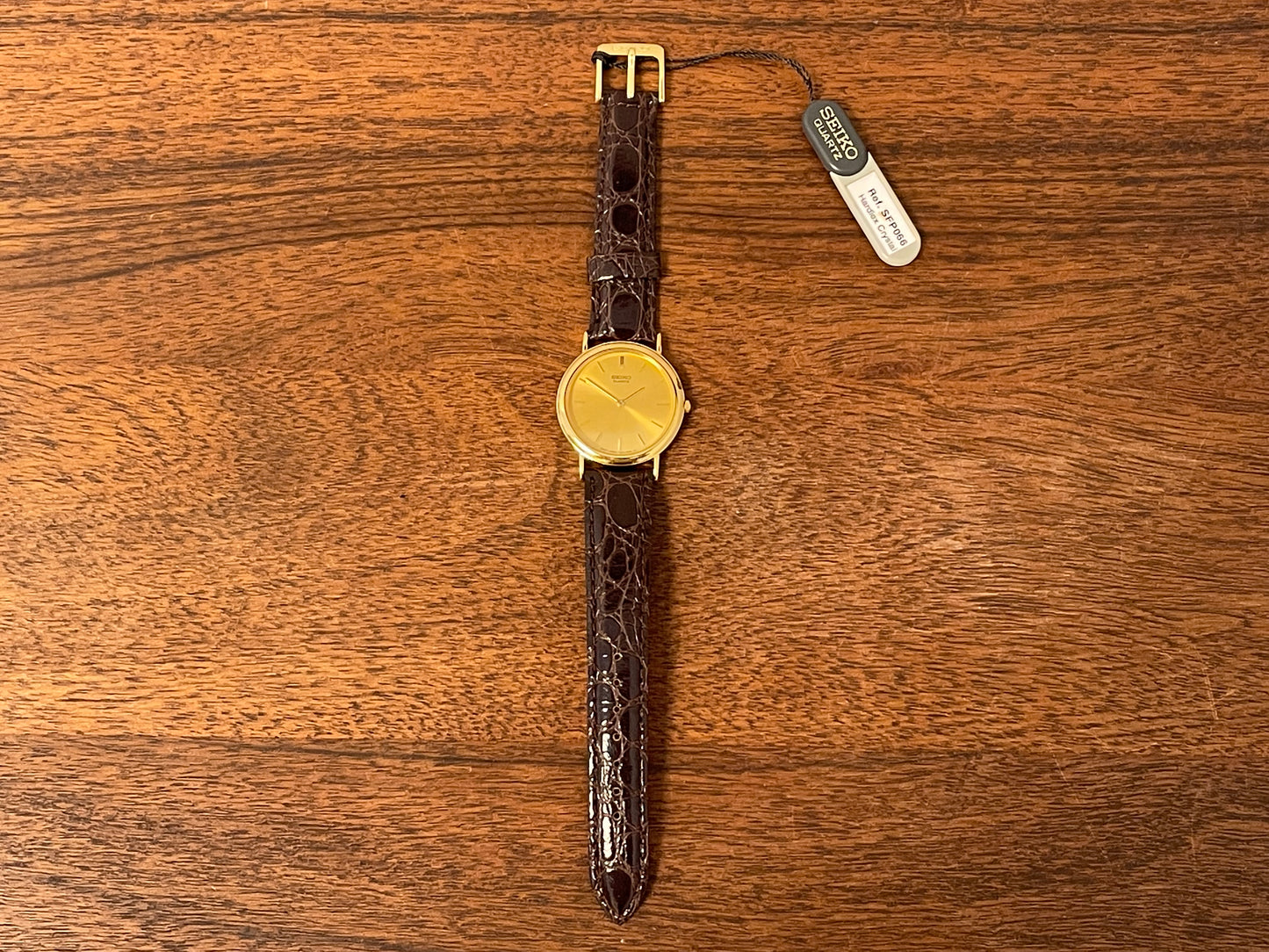 (2004) Seiko 7N00-6A70 dress watch -gold dial w/ gold markers - small size (NOS)