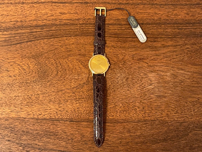 (2004) Seiko 7N00-6A70 dress watch -gold dial w/ gold markers - small size (NOS)