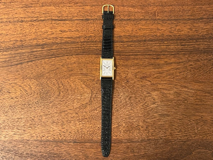 (1998) Tiffany & Co. Portfolio "Tank" dress watch - gold case - white dial w/ black Roman numerals (Mint)