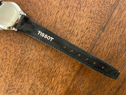 (1970s) Tissot 052-15007 Stylist dress watch - silver cushion case - silver brushed dial w/ silver stick markers - small size (NOS)