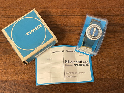 (1970s) Timex 290-181 UFO - white plastic case - blue & white dial w/ silver markers - small size (NOS + full set)