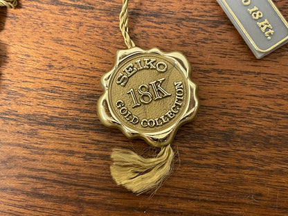 (1994) Seiko 7N00-S007 "Gold" 18K gold collection dress watch - 18k solid gold case - white dial w/ gold markers