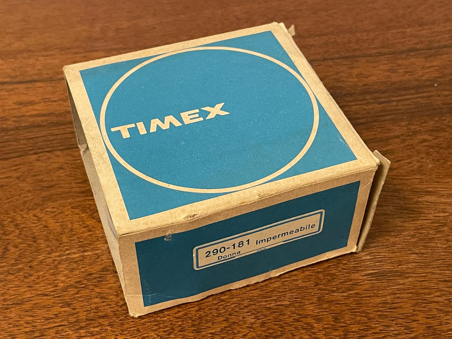 (1970s) Timex 290-181 UFO - orange plastic case - white dial w/ silver markers - small size (NOS + full set)