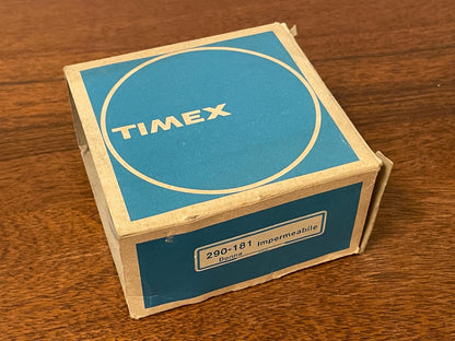 (1970s) Timex 290-181 UFO - orange plastic case - white dial w/ silver markers - small size (NOS + full set)