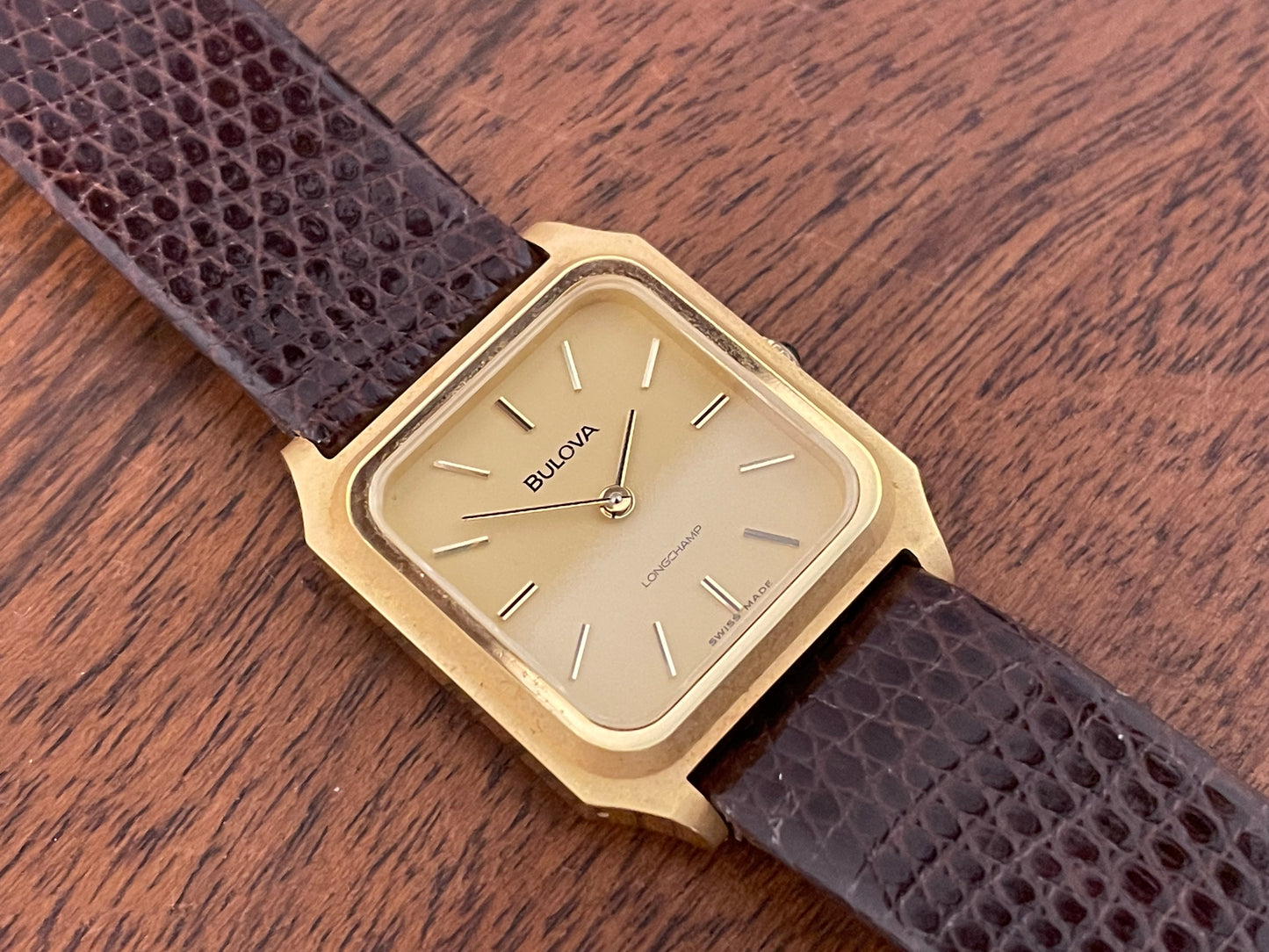 (1982) Bulova Longchamp "Tank" dress watch - gold case w/ champagne dial - small size (NOS)