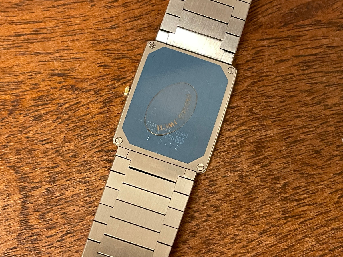 (1983) Seiko 6730-565H Lassale ultra thin - stainless steel bracelet - brushed gold dial w/ black stick markers (NOS)