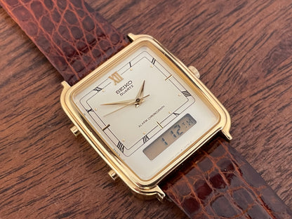 (1985) Seiko H601-5010 Alarm Chronograph - cream dial w/ gold Roman numerals (mint)