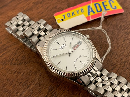 (1980) ADEC (by Citizen) "Day-Date" - fluted bezel - silver dial w/ stick markers - small size (NOS)