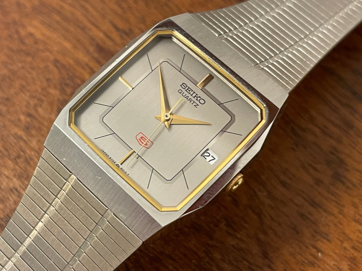 (1985) 5Y02-5010 Seiko 5 quartz - integrated bracelet - silver brushed dial w/ stick markers (mint)