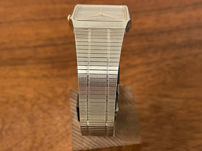 (1985) 5Y02-5010 Seiko 5 quartz - integrated bracelet - silver brushed dial w/ stick markers (mint)