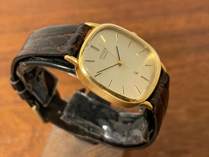 (1970s) Citizen 47-5181 "Ellipse" dress watch - 18K solid gold case - brushed champagne dial w/ gold markers