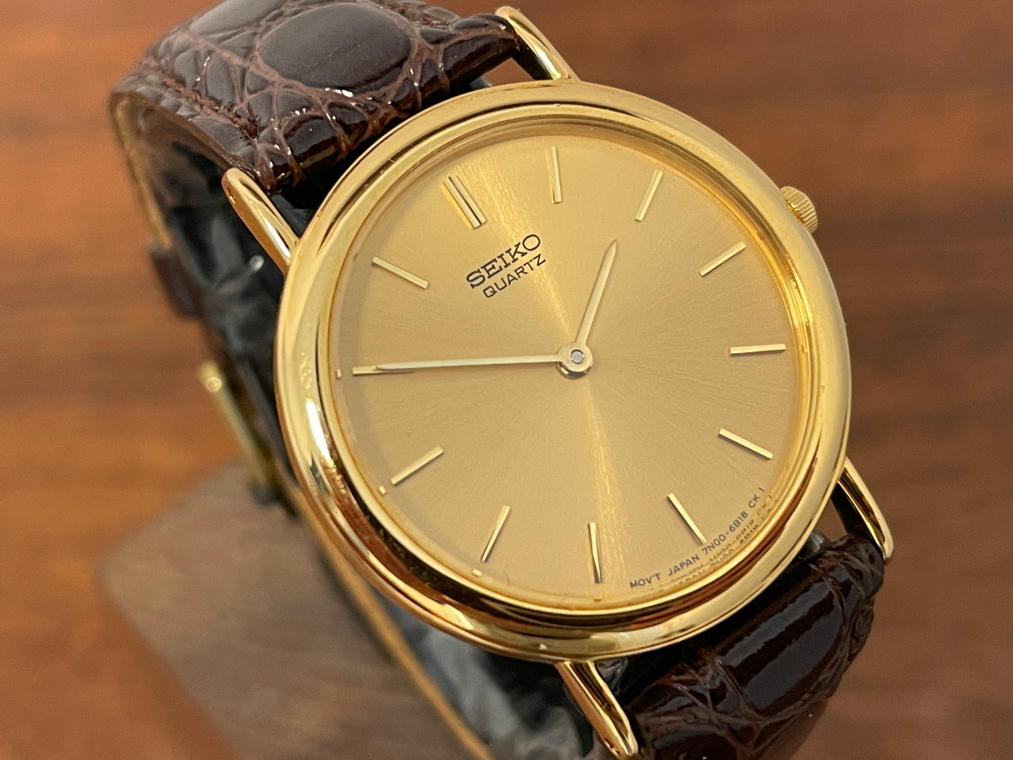 (2004) Seiko 7N00-6A70 dress watch -gold dial w/ gold markers - small size (NOS)