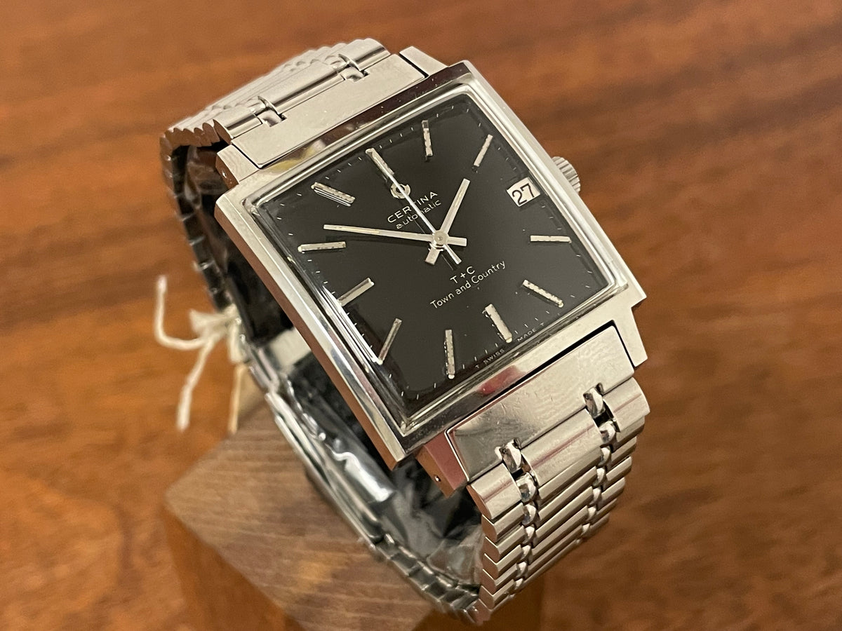 (1960s) Certina 5301.115 Town & Country - bracelet - square case - black dial w/ silver markers (NOS)