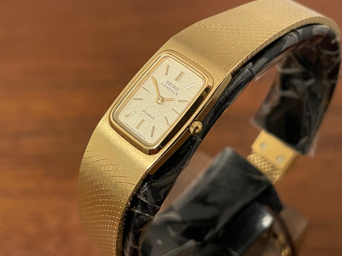 (1981) Seiko 8420-5219 Lassale dress watch - gold integrated bracelet & case - gold dust dial w/ gold stick markers - small size (NOS)