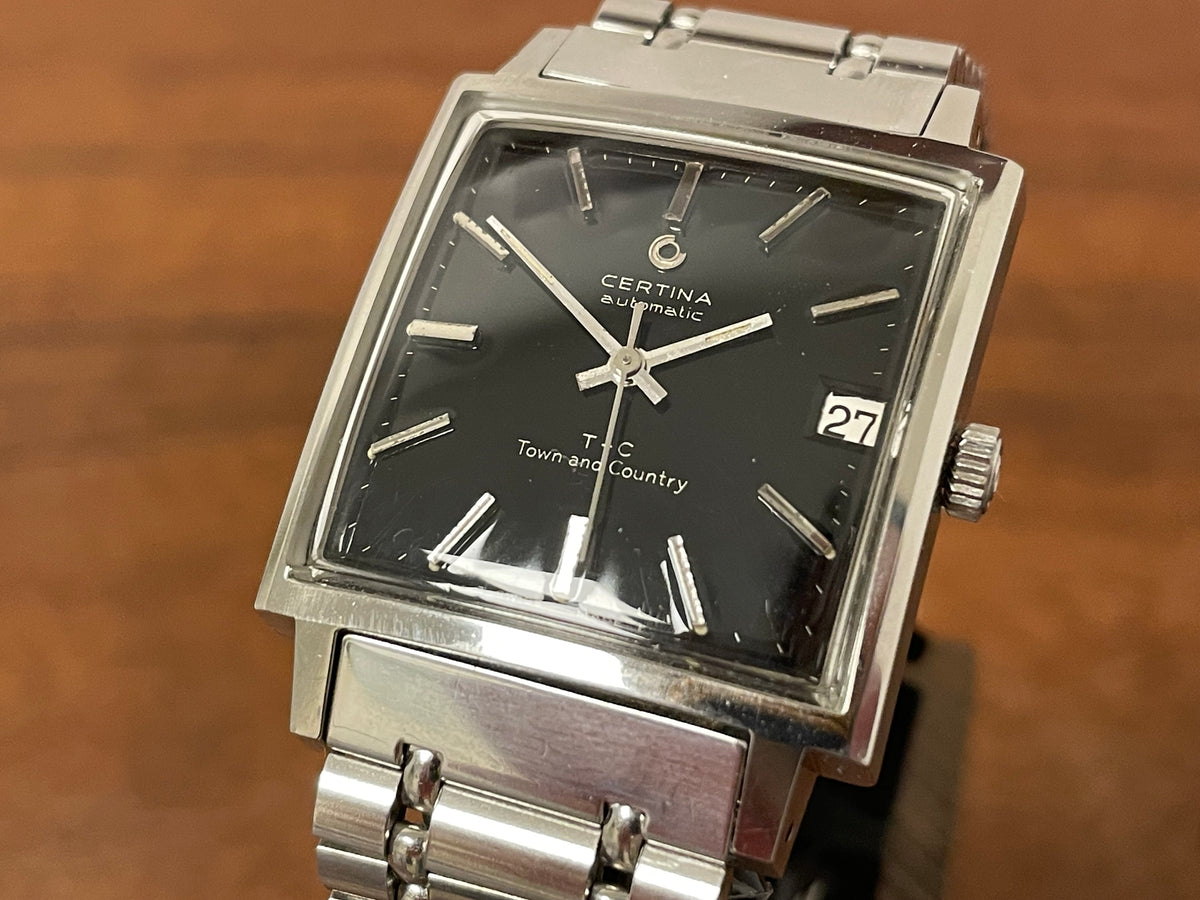 (1960s) Certina 5301.115 Town & Country - bracelet - square case - black dial w/ silver markers (NOS)