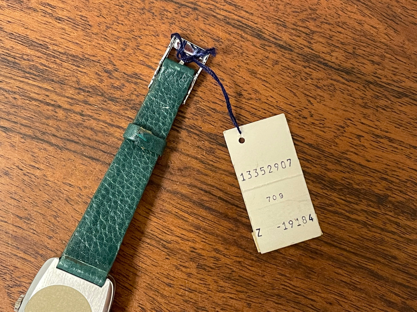 (1970s) Tissot Stylist dress watch - oval grey sunburst dial w/ white stick markers - small size (NOS)