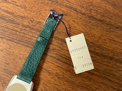 (1970s) Tissot Stylist dress watch - oval grey sunburst dial w/ white stick markers - small size (NOS)