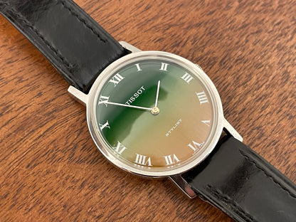 (1970s) Tissot 41070 Stylist dress watch - silver case - brushed green/orange gradient dial w/ white Roman numerals (NOS)