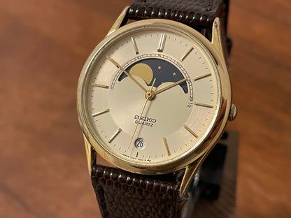 (1984) Seiko 7434-7000 dress watch - champagne dial w/ moonphase & stick markers