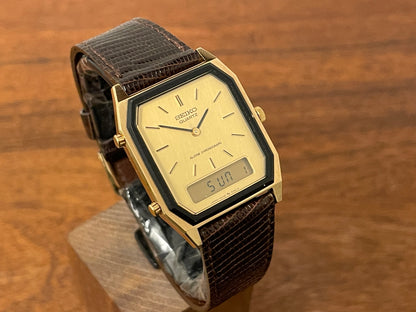 (1984) Seiko H448-5130 Alarm Chronograph - gold dial w/ gold markers & digital display