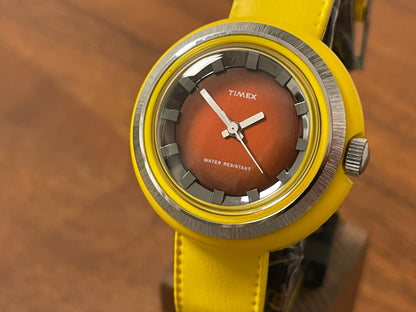 (1970s) Timex 290-071 UFO - yellow plastic case - brown dial w/ silver markers - small size (NOS + full set)