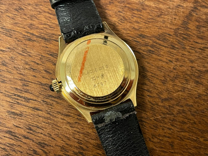 (1970s) Certina 6797 dress watch - gold plated 10M case - green dial w/ diamond markers - small size (NOS)