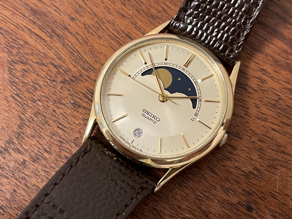 (1984) Seiko 7434-7000 dress watch - champagne dial w/ moonphase & stick markers