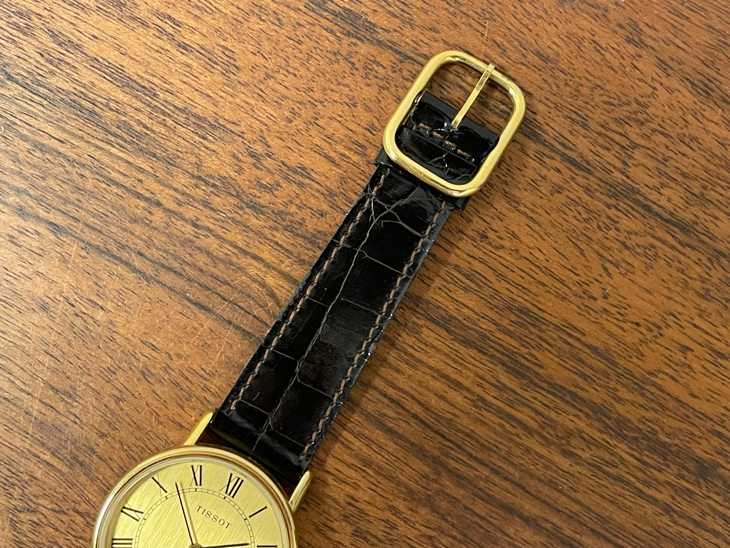 (1970s) Tissot 40771 Stylist dress watch - gold case - brushed gold dial w/ black Roman numerals (NOS)