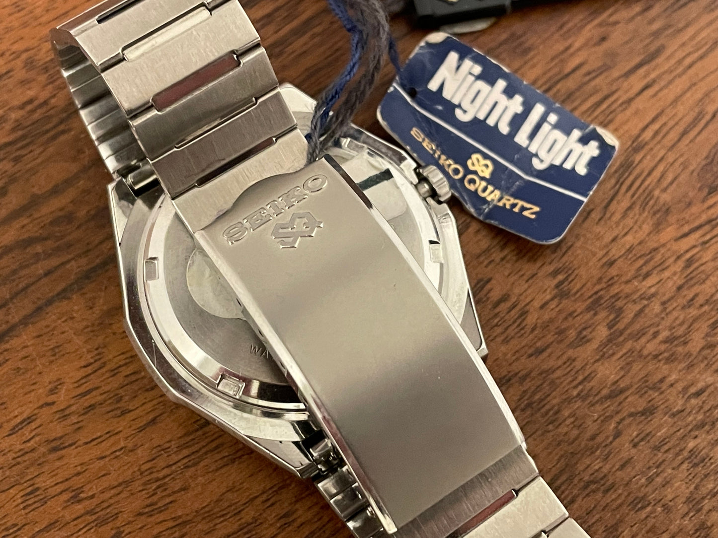 (1979) Seiko 7559-5000 Quartz "Night Light" - black dial w/ silver markers (NOS)