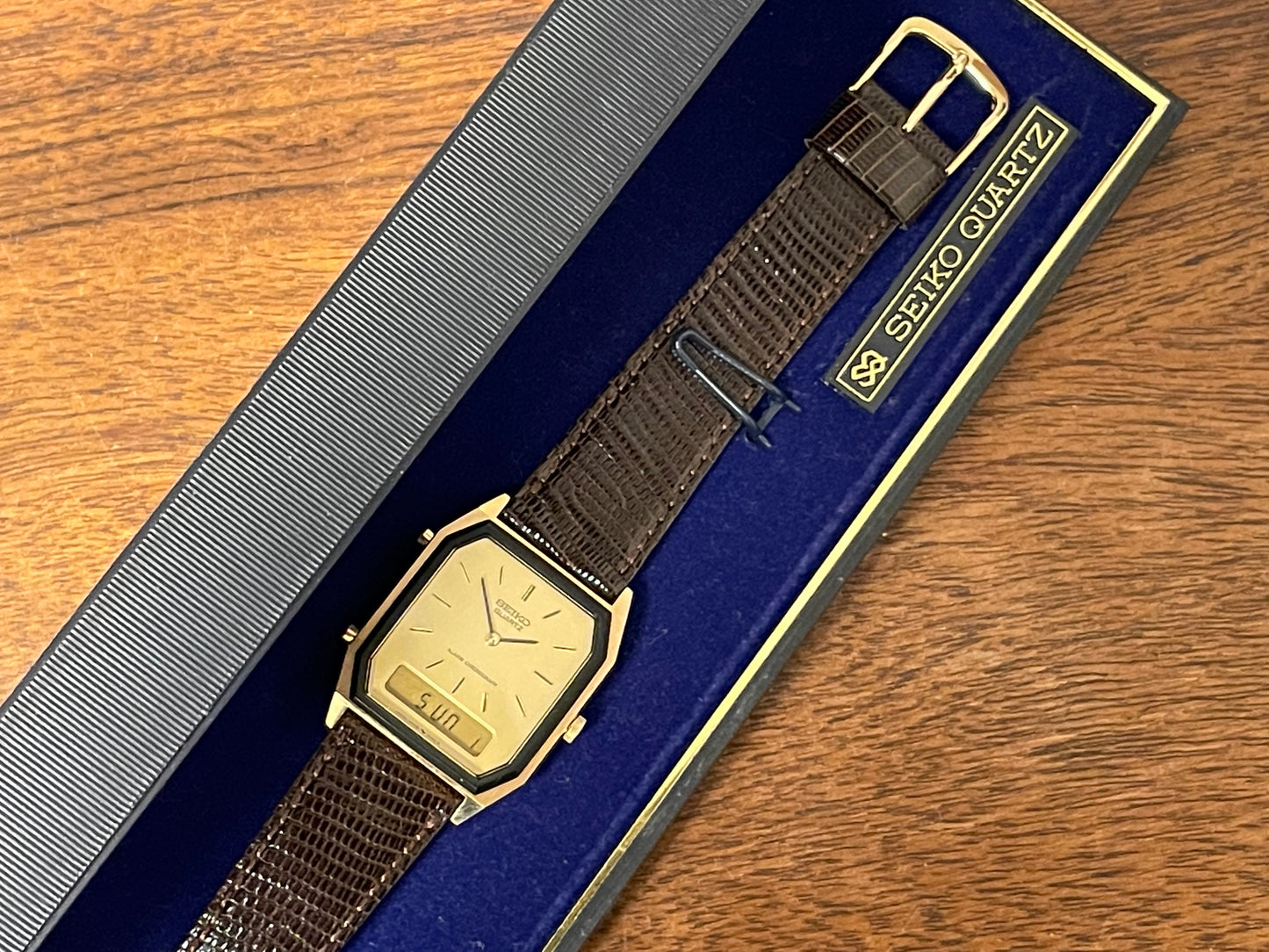 (1984) Seiko H448-5130 Alarm Chronograph - gold dial w/ gold markers & digital display