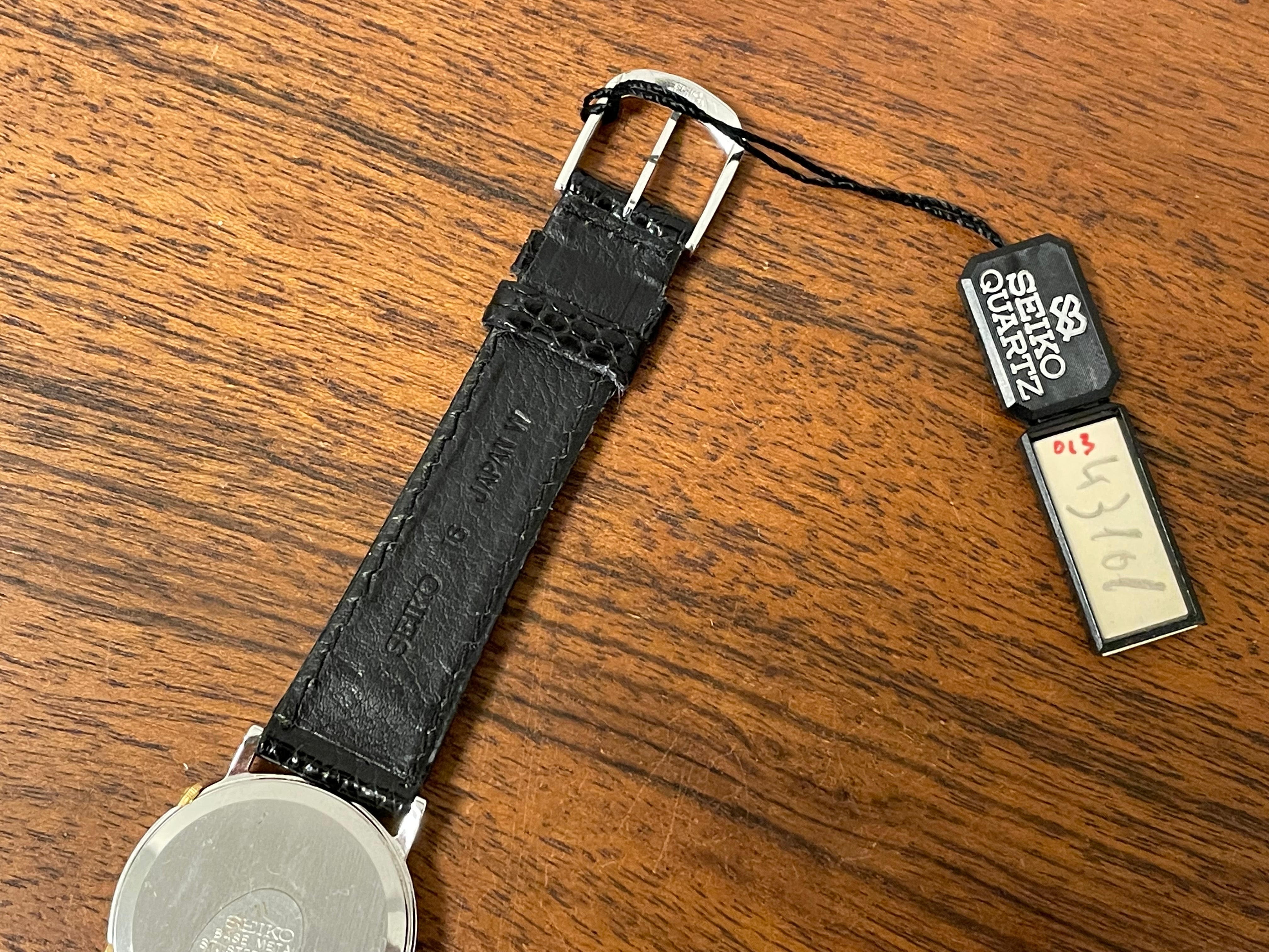 1985) Seiko 1E20-0160 dual time dress watch - round case - white