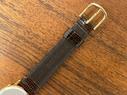 (1985) Seiko 1E20-0160 dual time dress watch - round case - gold textured dial w/ 2 subdials