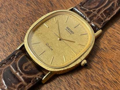 (1981) Seiko 6030-5410 Dolce "Ellipse" - gold plated case w/ etched bezel - gold textured dial w/ gold markers