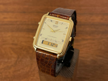 Front side (1985) Seiko H601-5010 Alarm Chronograph - cream dial w/ gold Roman numerals (mint)