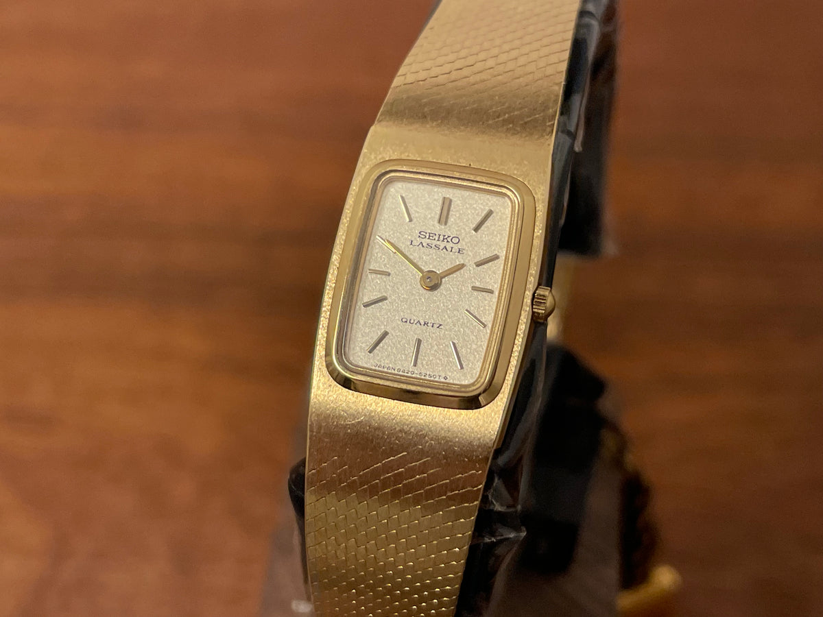 (1981) Seiko 8420-5219 Lassale dress watch - gold integrated bracelet & case - gold dust dial w/ gold stick markers - small size (NOS)