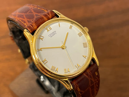 (1981) Citizen 6031-S38419 dress watch - white dial w/ gold Roman numerals - small size (NOS)