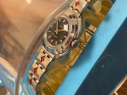 (1970s) Timex 509-528 dress watch - silver case - black dial w/ silver & red markers - small size (NOS + full set)