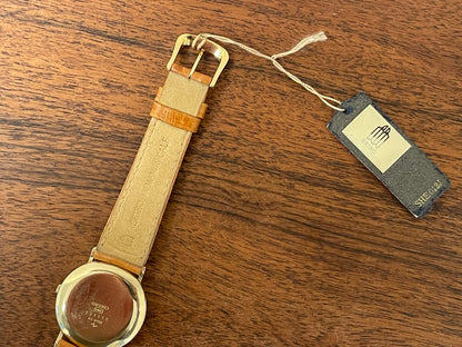 (1977) Seiko 43-0150 14K solid gold dress watch - rope bezel -  gold textured dial w/ gold markers