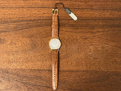 (1992) Seiko 7N00-6A00 dress watch - white dial w/ Roman numerals & Spade hands (NOS)
