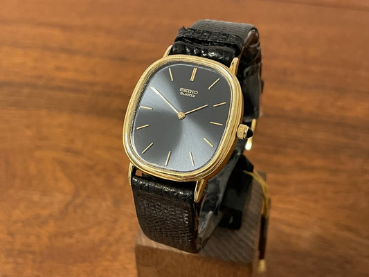 Front side (1979) Seiko 7800-5299  "Ellipse" 14K solid gold (11 g) dress watch - blue sunburst dial w/ gold markers