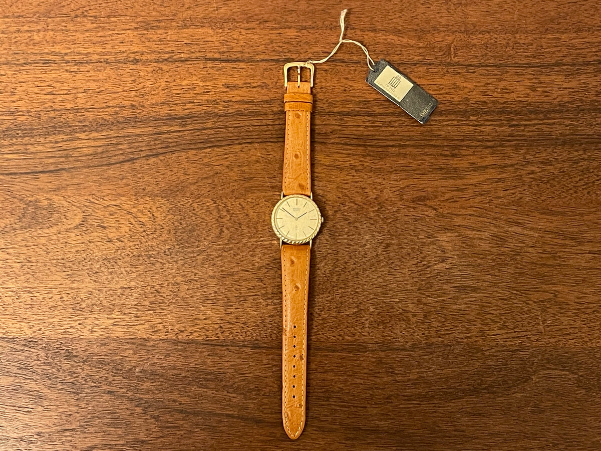 (1977) Seiko 43-0150 14K solid gold dress watch - rope bezel -  gold textured dial w/ gold markers