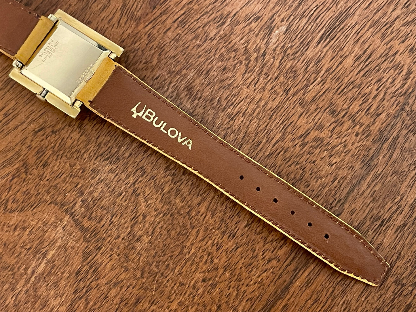 (1969) Bulova 62905-5Y President "G" M9 square dress watch - champagne dial with gold Roman numerals (serviced)