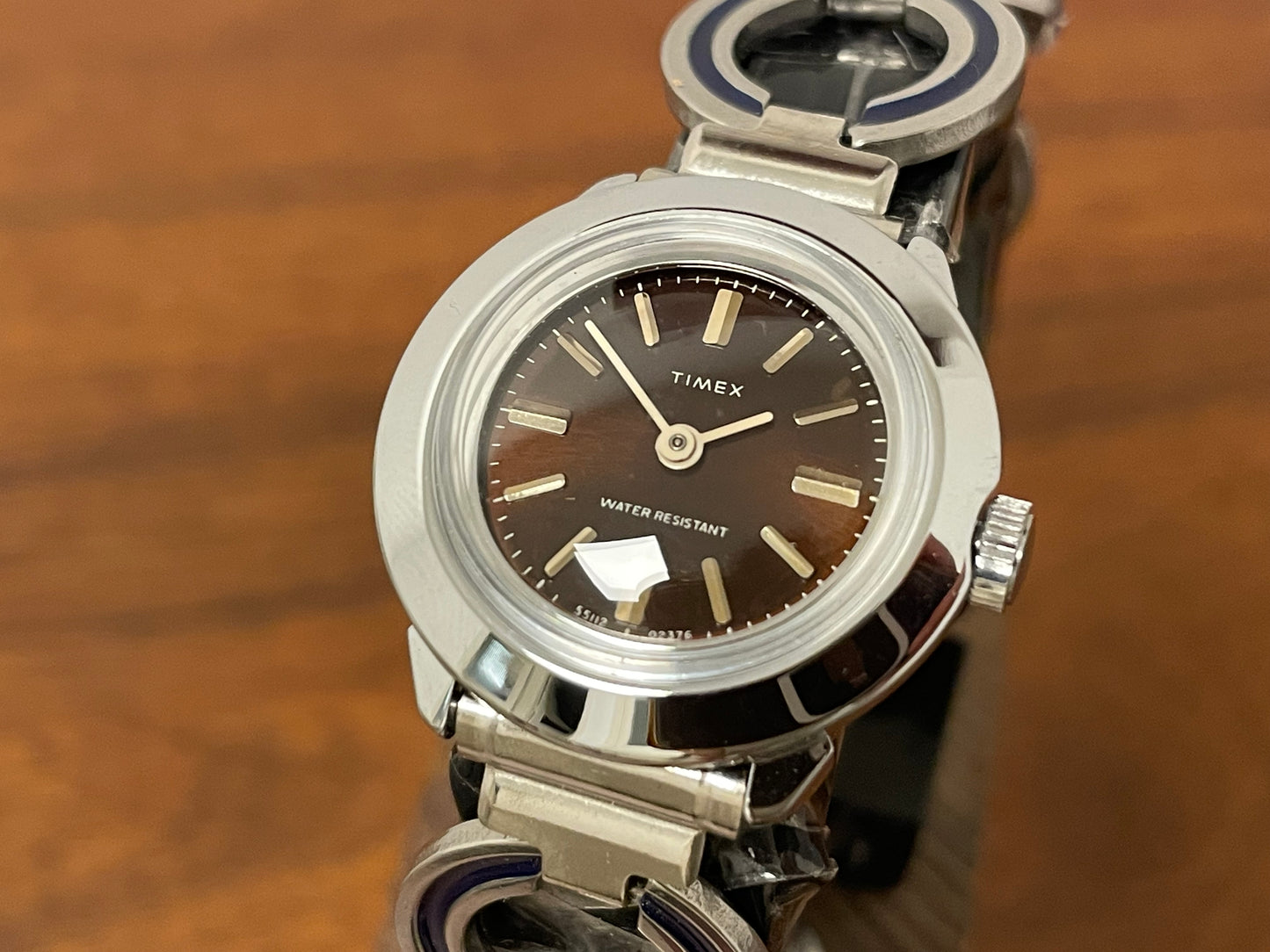(1970s) Timex 551-125 dress watch - silver case - brown dial w/ silver markers - small size (NOS + full set)