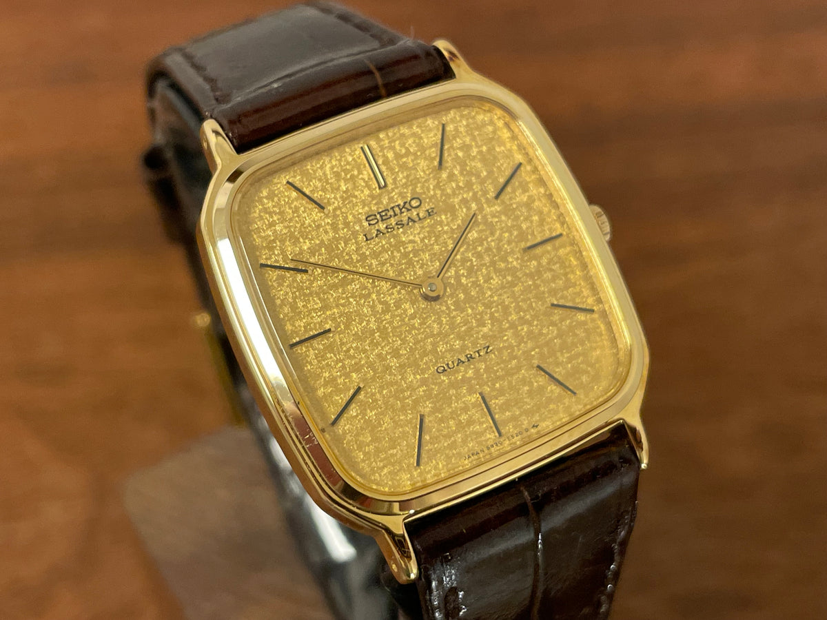(1981) Seiko 5930-5509 Lassale dress watch - gold textured dial w/ gold stick markers (NOS)