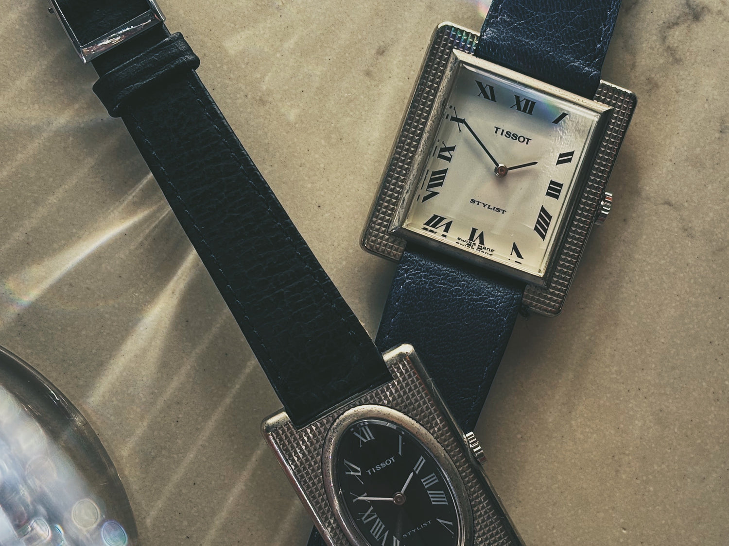 A mens and ladies Tissot Stylist "Tank" with  decorated "Clous de Paris" case