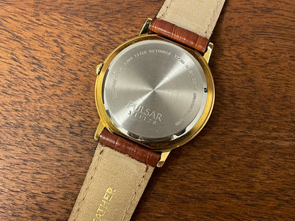 (2003) Pulsar V532-8B40 dress watch - gold colored case - white dial w/ gold markers (NOS)