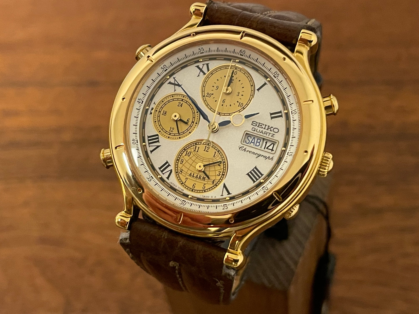 (1992) Seiko 7T39-7A00 Age of Discovery (AOD) chronograph -  gold case w/ white speckled dial (NOS)
